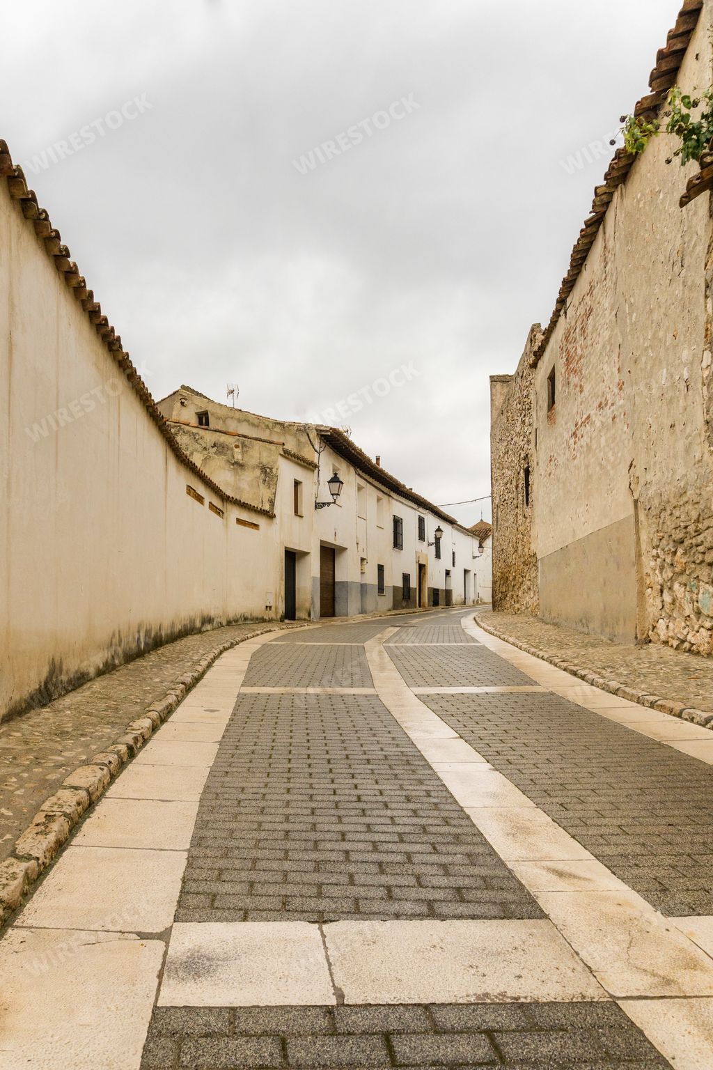 A narrow old street of the town of Chinchon near Madrid, Spain