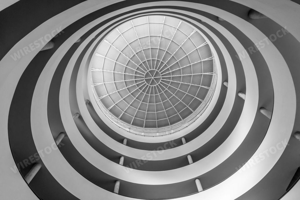 Perspective of the roof of a building with circular shapes in black and white