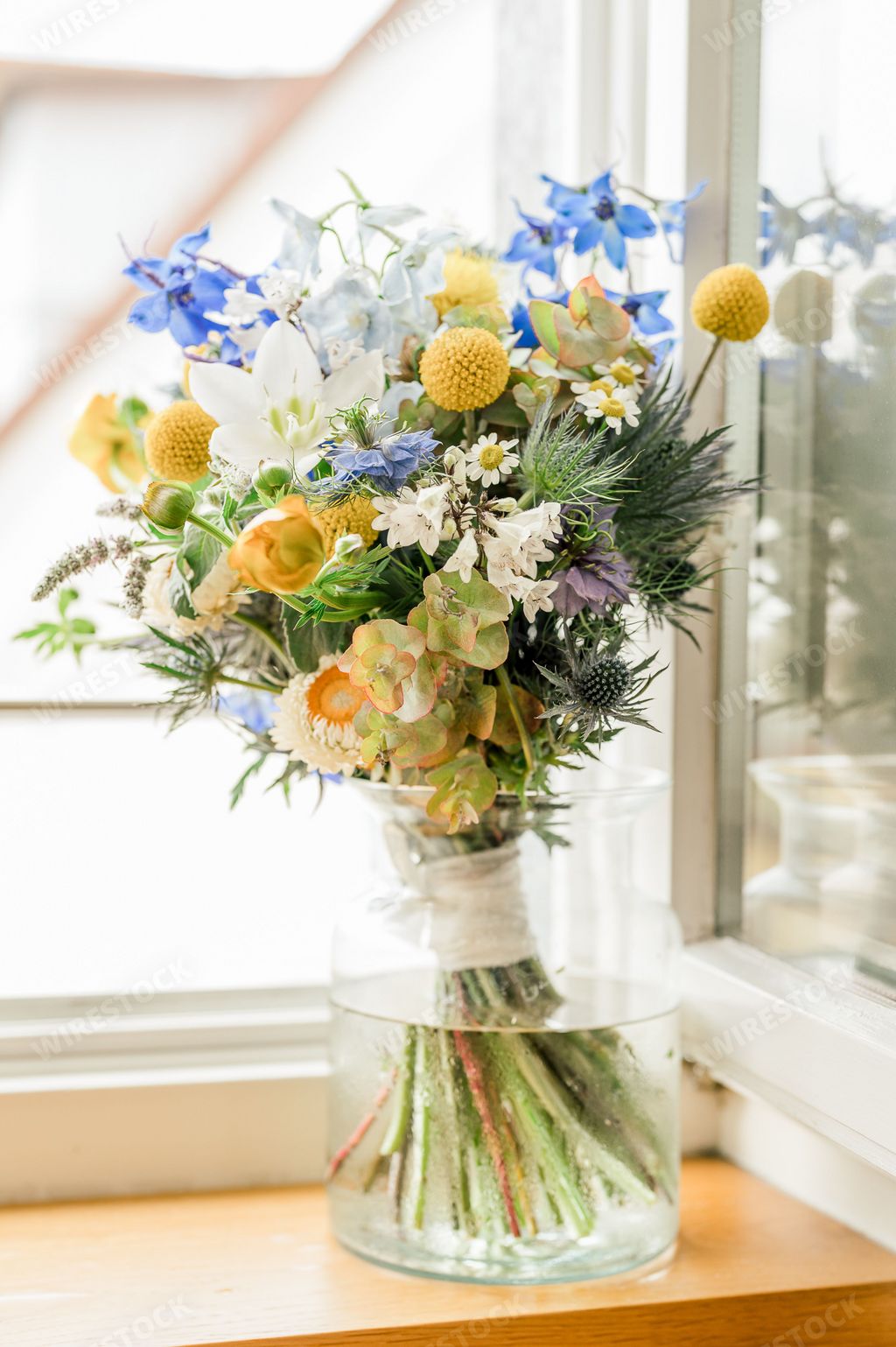 A vertical shot of wedding bouquet in vase