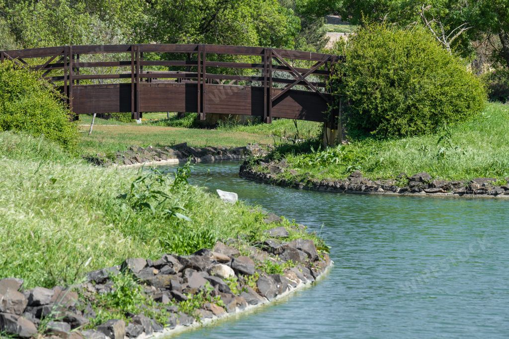 A scenic view of a wooden bridge in the Adventure Park do Jamor in Lisbon