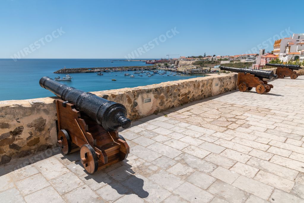 A scenic view of vintage cannon monuments seen from the castle of Sines, Portugal on the coast