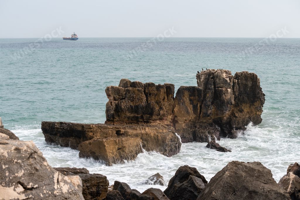 The Pedra da Nau rock along the coast in Cascais, Portugal