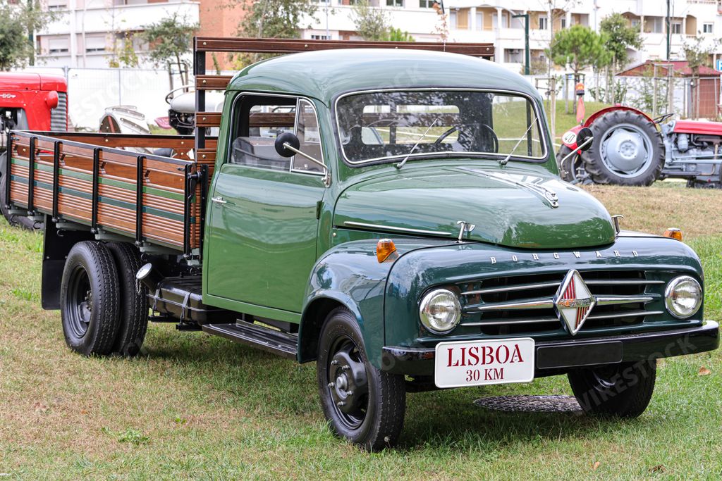 A green Borgward b1500 van during an exhibition in a park