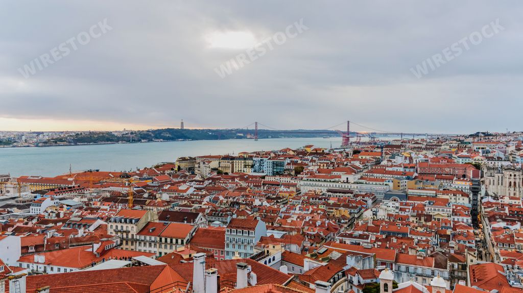 The Lisbon skyline with the 25 de Abril Bridge in the background.