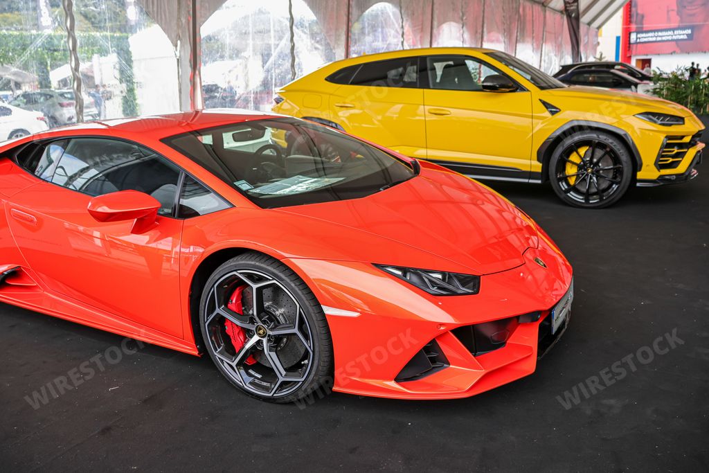 A luxurious orange sports car Lamborghini Huracan EVO