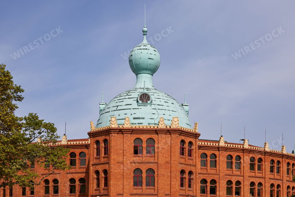 The historic building of Cinema City Campo Pequeno under the blue sky in Lisbon