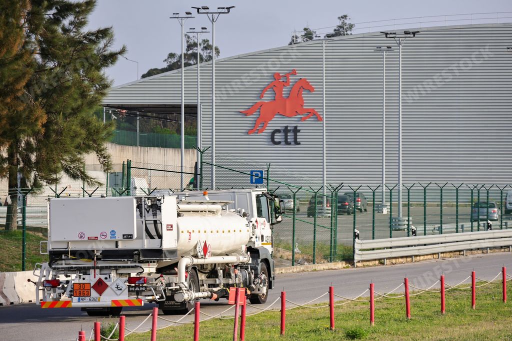 A fuel supply vehicle next to the CTT Correios de Portugal building