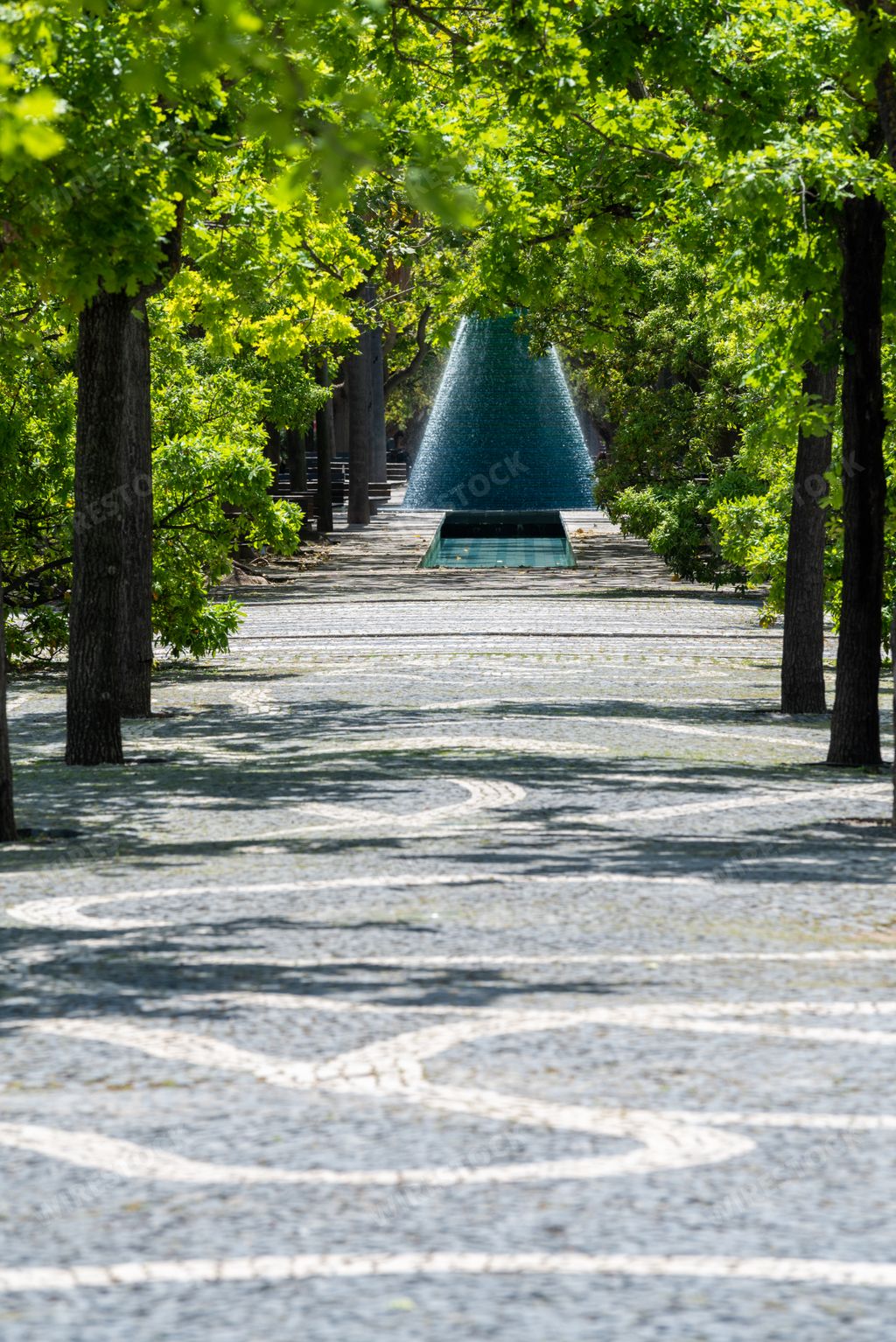 Water sources known as volcanoes at the end of a pathway in Alameda dos Oceanos, Parque das Nacoes, Lisbon