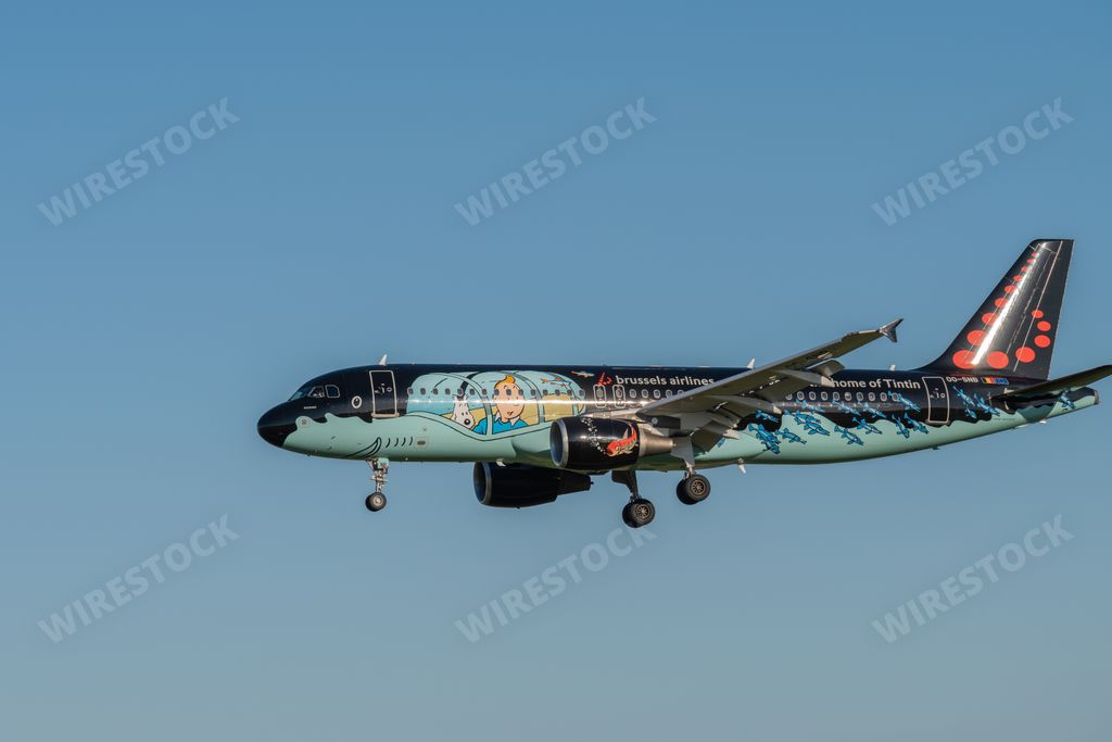 The Airbus A320-214 of Brussels Airlines (Tintin comics Livery) approaching the runway at Lisbon airport