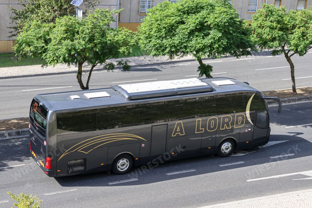 Luxury tourist bus in the streets of Lisbon Portugal