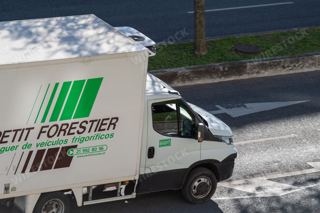 A photo of the vehicle of the Petit Forestier company transporting goods in Lisbon