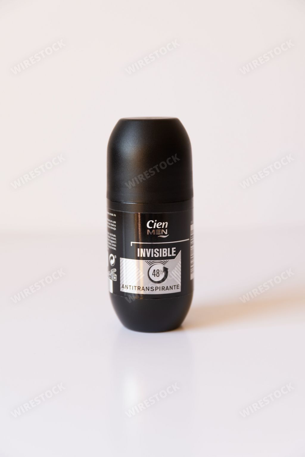 A vertical close-up shot of a Cien deodorant for men on a white background.