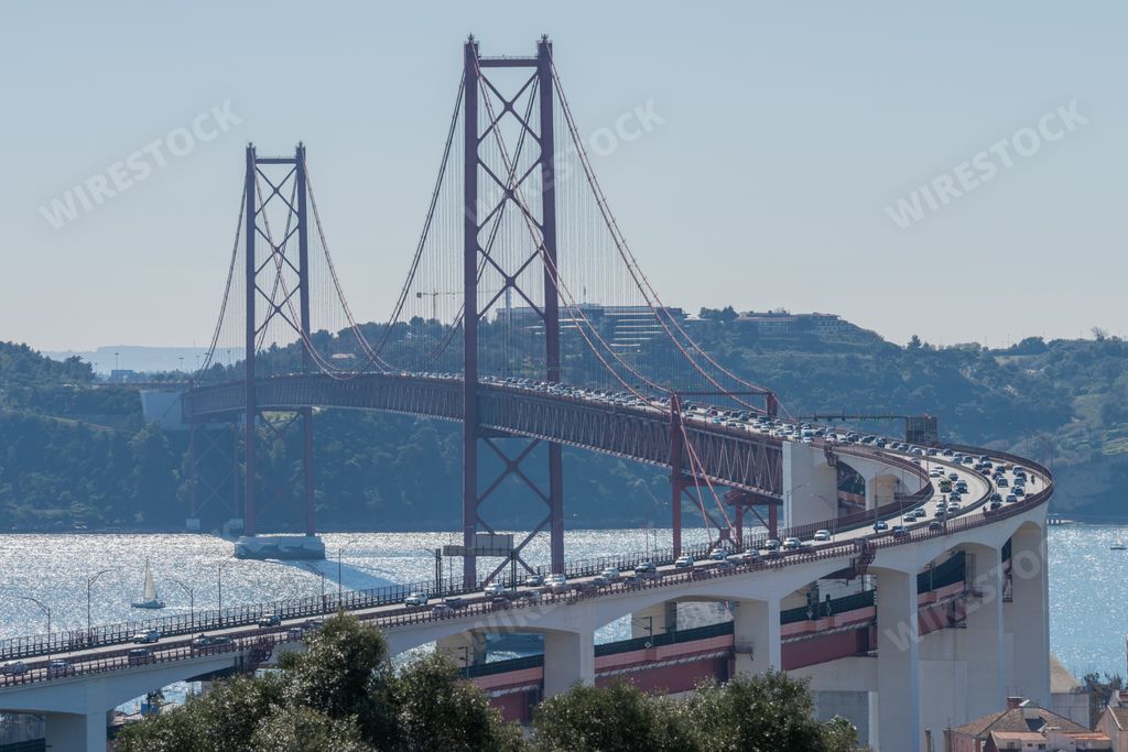 An aerial view of the 25 de Abril Bridge in Lisbon, Portugal