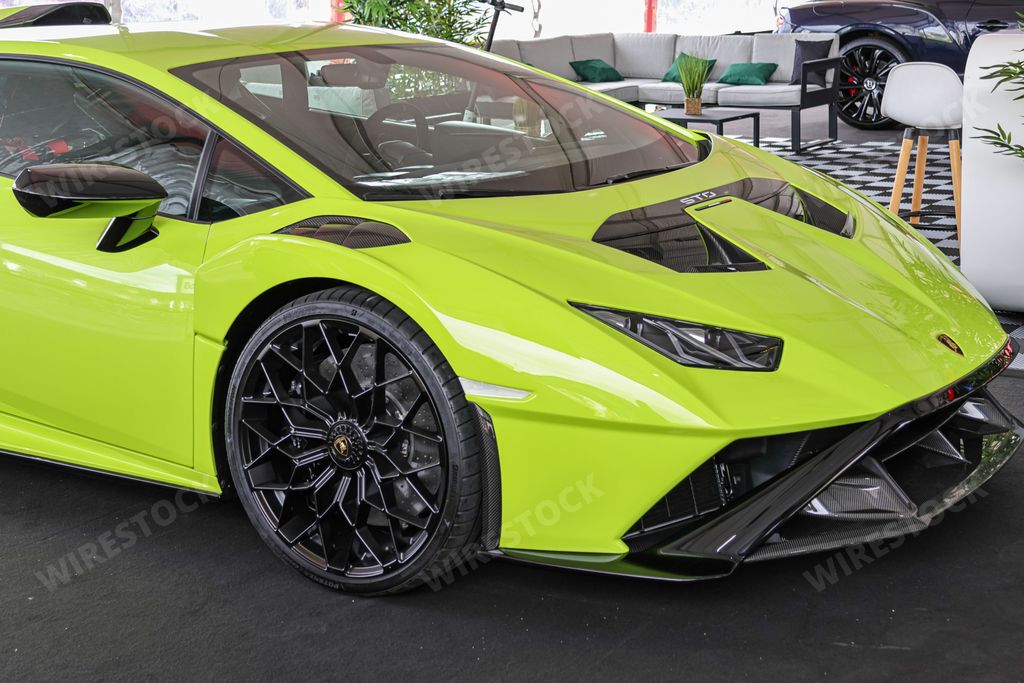 A luxurious green sports car Lamborghini Huracan STO