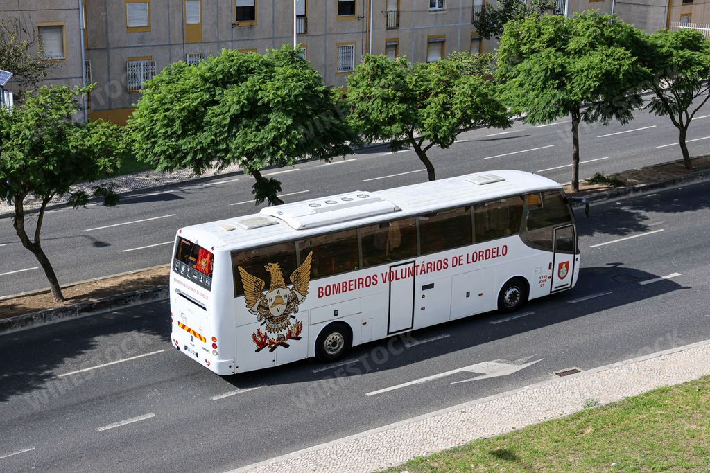 Lordelo volunteer firefighters tour bus in the streets of Lisbon