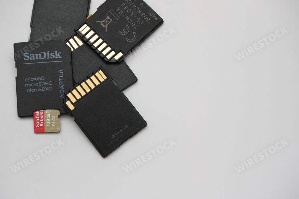 The SD memory cards from Sandisk manufacturer on a white background