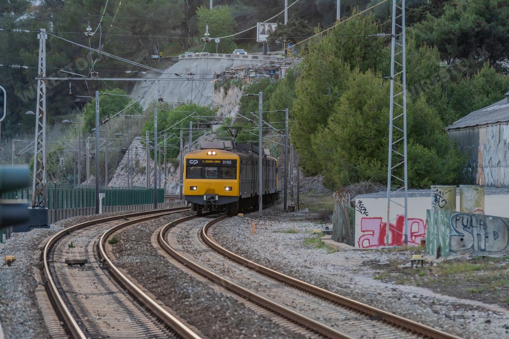 A yellow urban train of the company CP in Lisbon