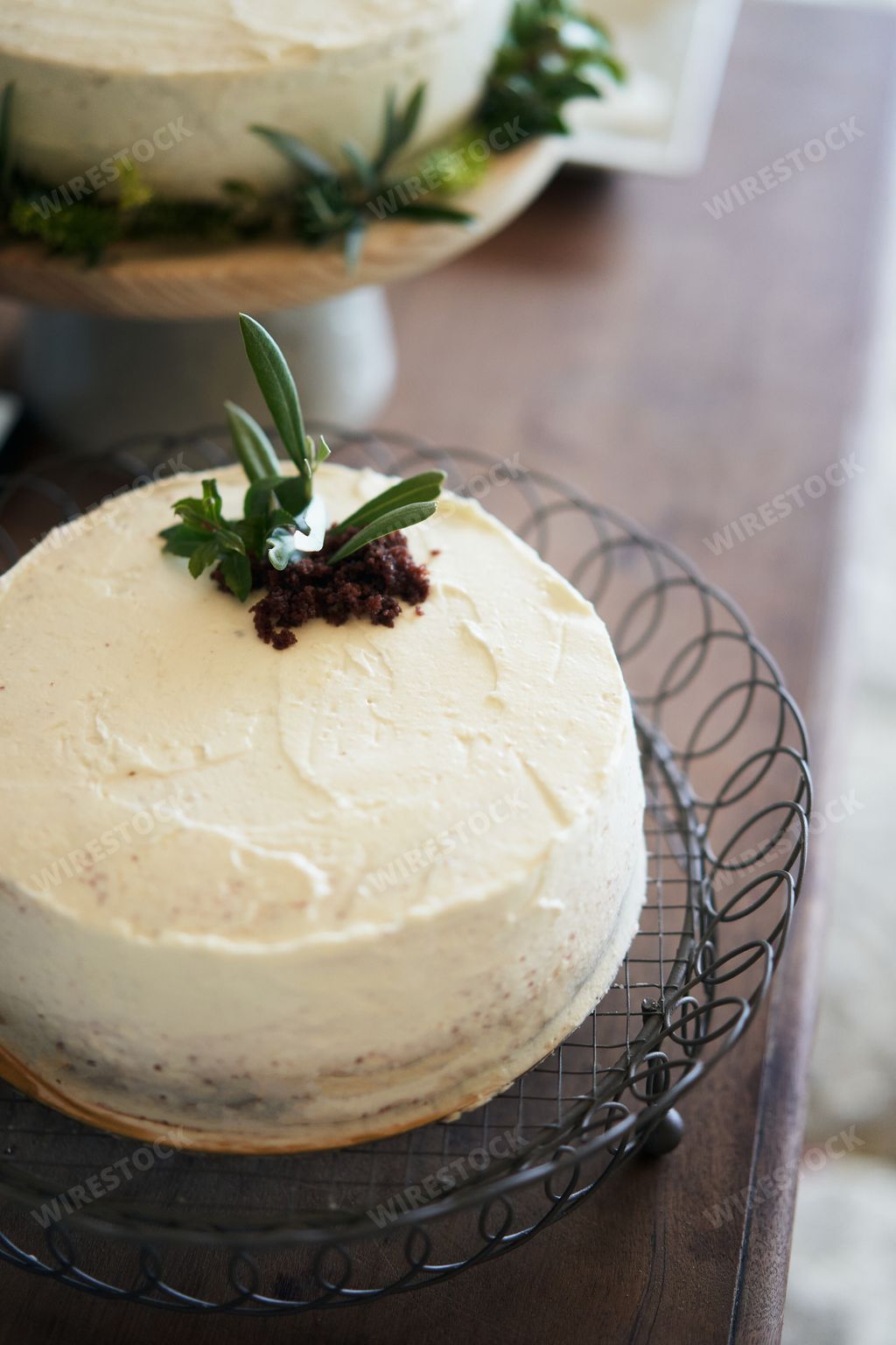 A vertical picture of a white yummy cake in the store
