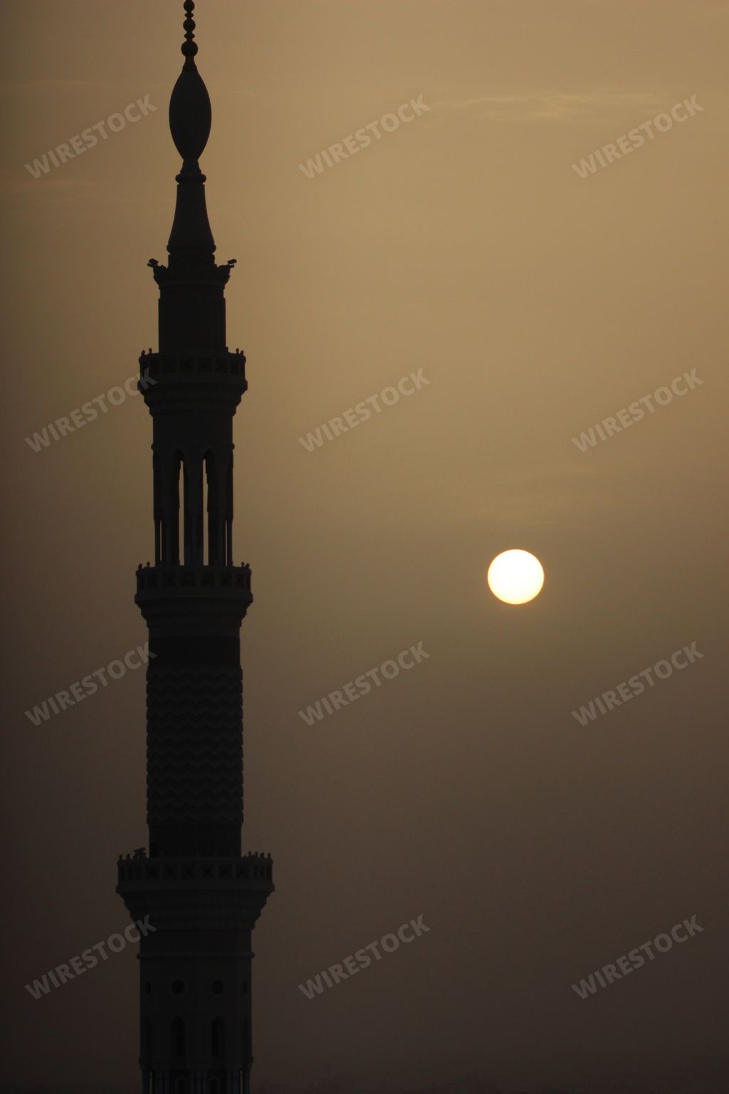 A beautiful shot of the victory tower known as the Qutb Minar in Delhi India captured in the sunset