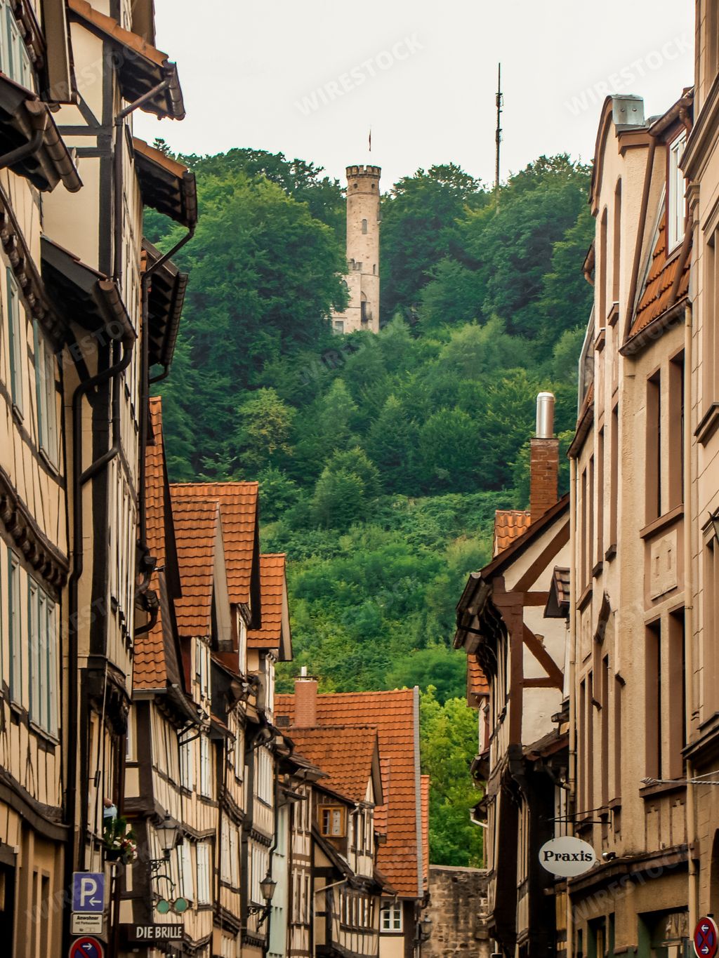 Han Munden, Germany - July 9, 2018 : Beautiful traditional German houses and old castle in Han Munden town. Vertical photo.