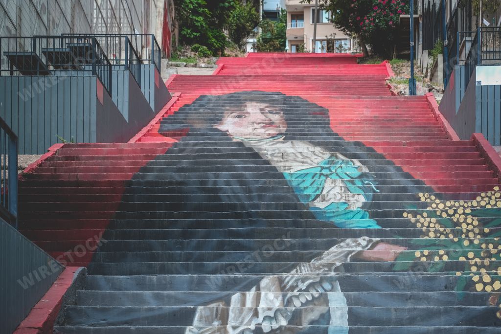Osman Hamdi Bey’s “Woman with Mimosa” on a slope in Karakoy, Istanbul, Turkey