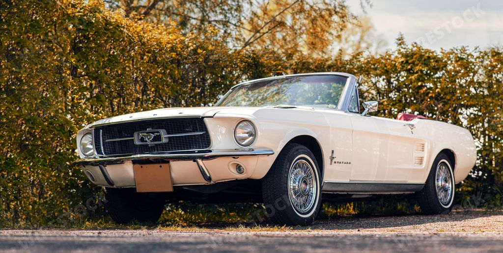 An old vintage Ford Mustang convertible classic car outdoors