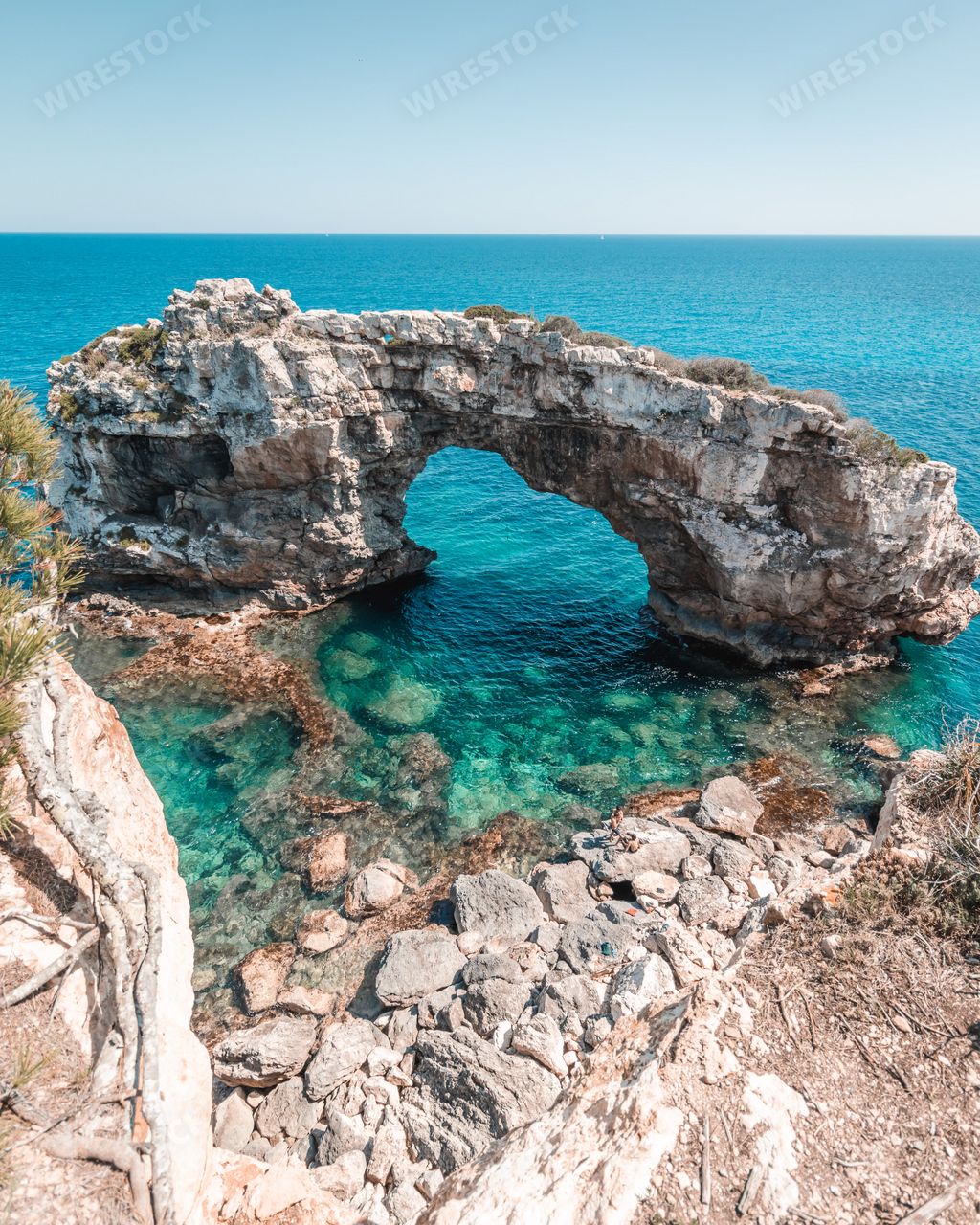 A beautiful view of the Es Pontas natural arch in the southeastern part of the island of Mallorca