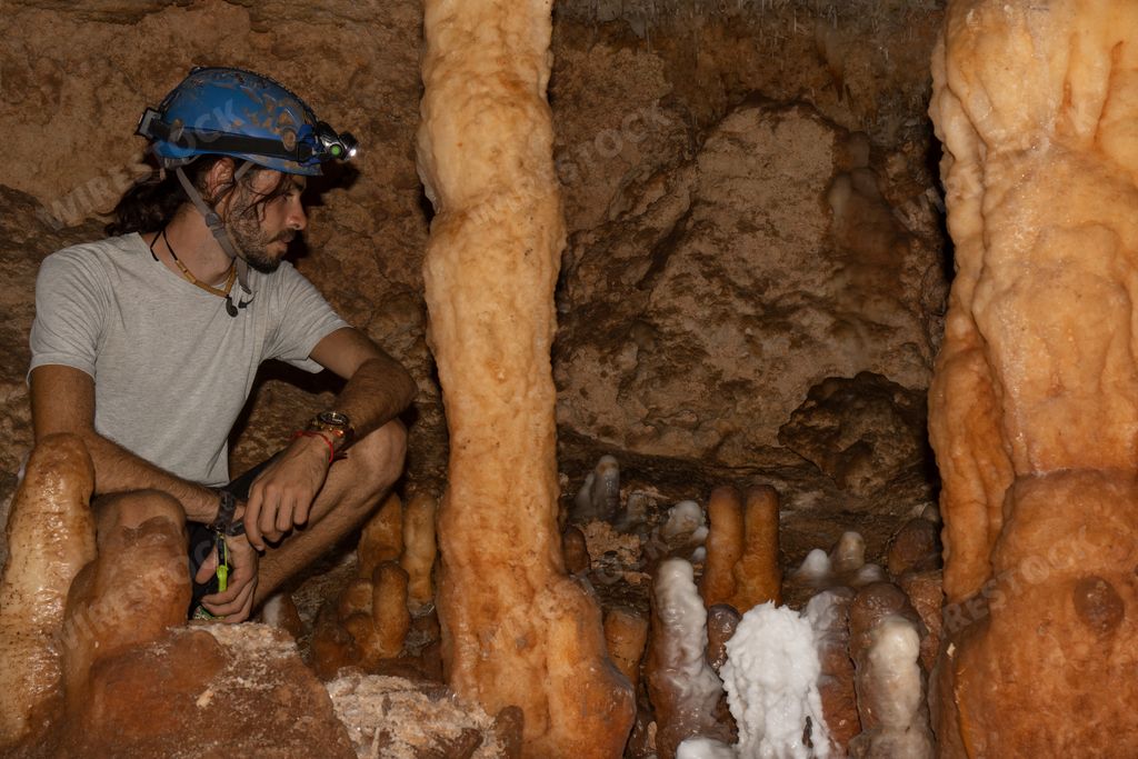 A young tourist in a miner helmet in the large Bellamar caves (Cuevas de Bellamar), Cuba