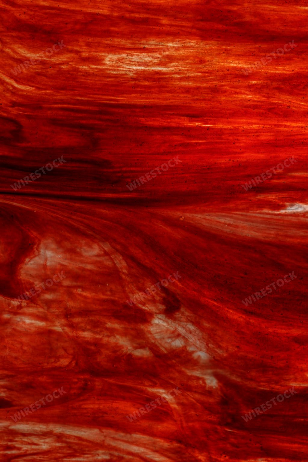 A vertical image of red and yellow backlit corrugated glass - Abstract background for self-adhesive films