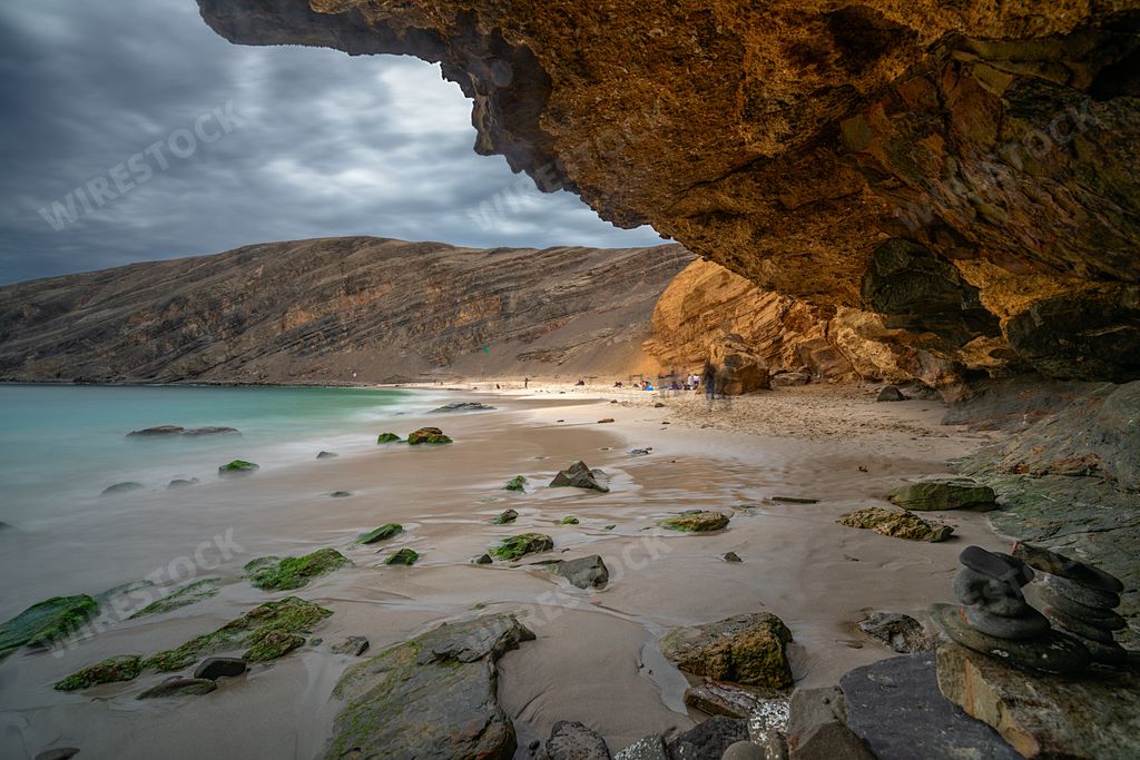 The coast and red sand beach of Paracas National Reserve in Peru