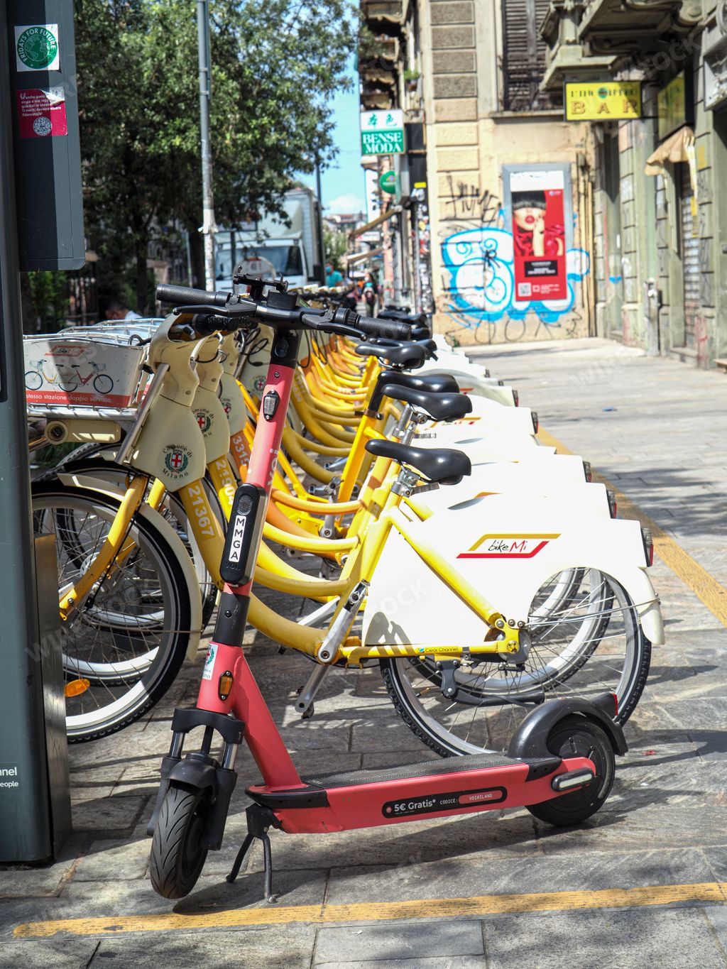 A Electric bikes and scooter rental by smartphone app in Milan Italy