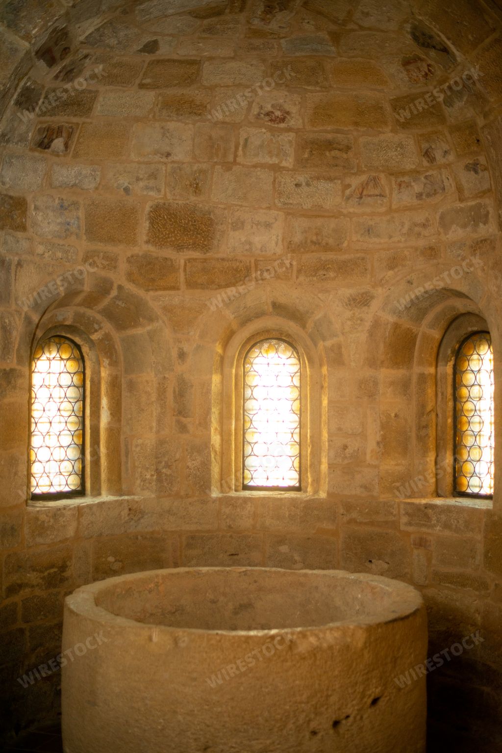 A vertical shot of a historical roman bathtub