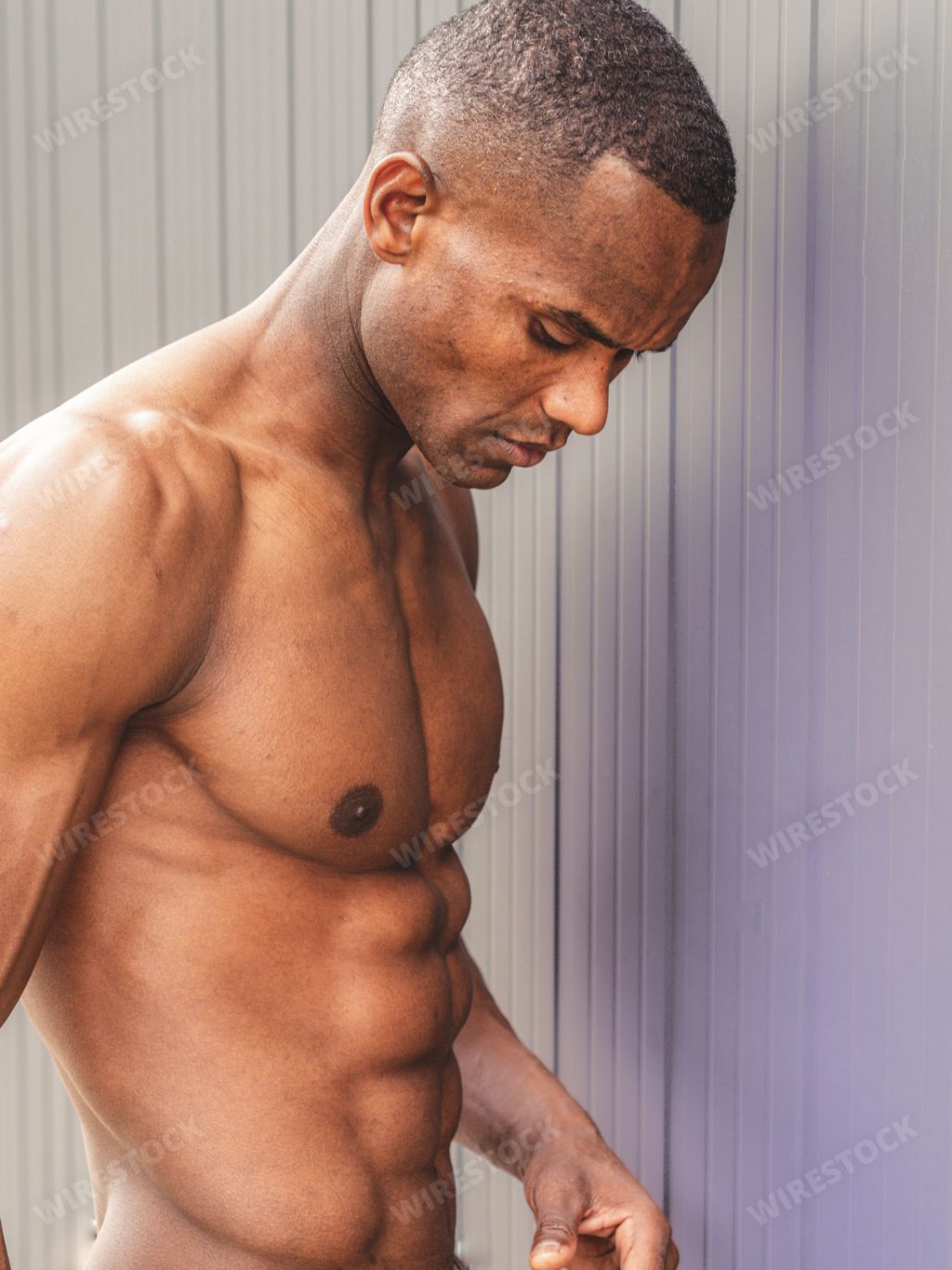An African-American fit man with six-pack abs