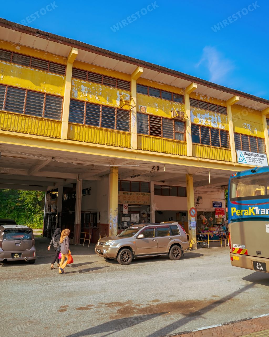 Perak, Malaysia - Aug 12, 2022 : Bus station in an old town of Tapah in the morning. Tapah is a unique place with vintage buildings.
