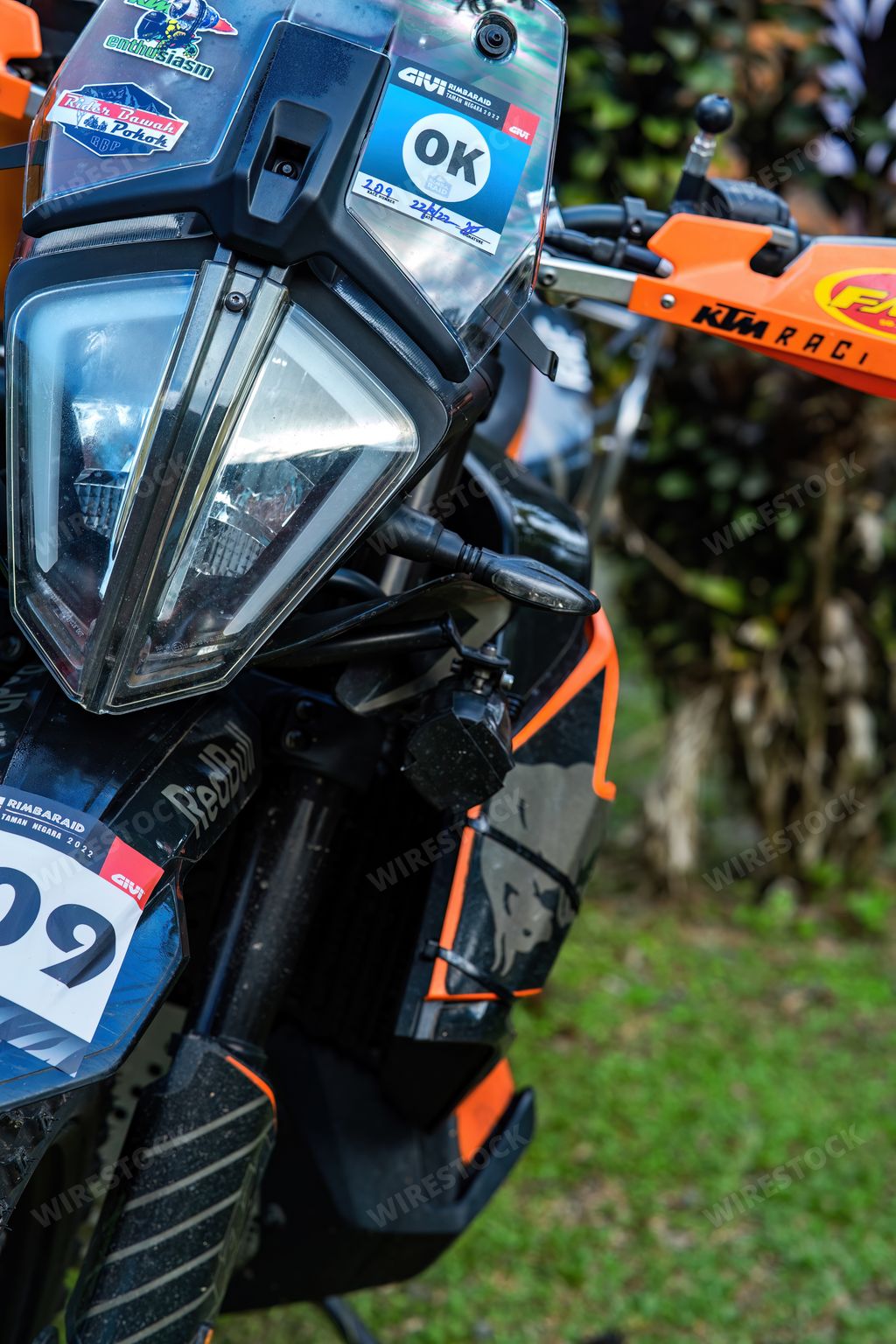 A vertical shot of KTM Motorcycle's with stickers for enduro practice