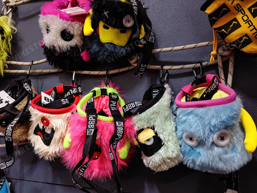 A selection of powder bags for rock climbing at the Corezone outdoor sports shop
