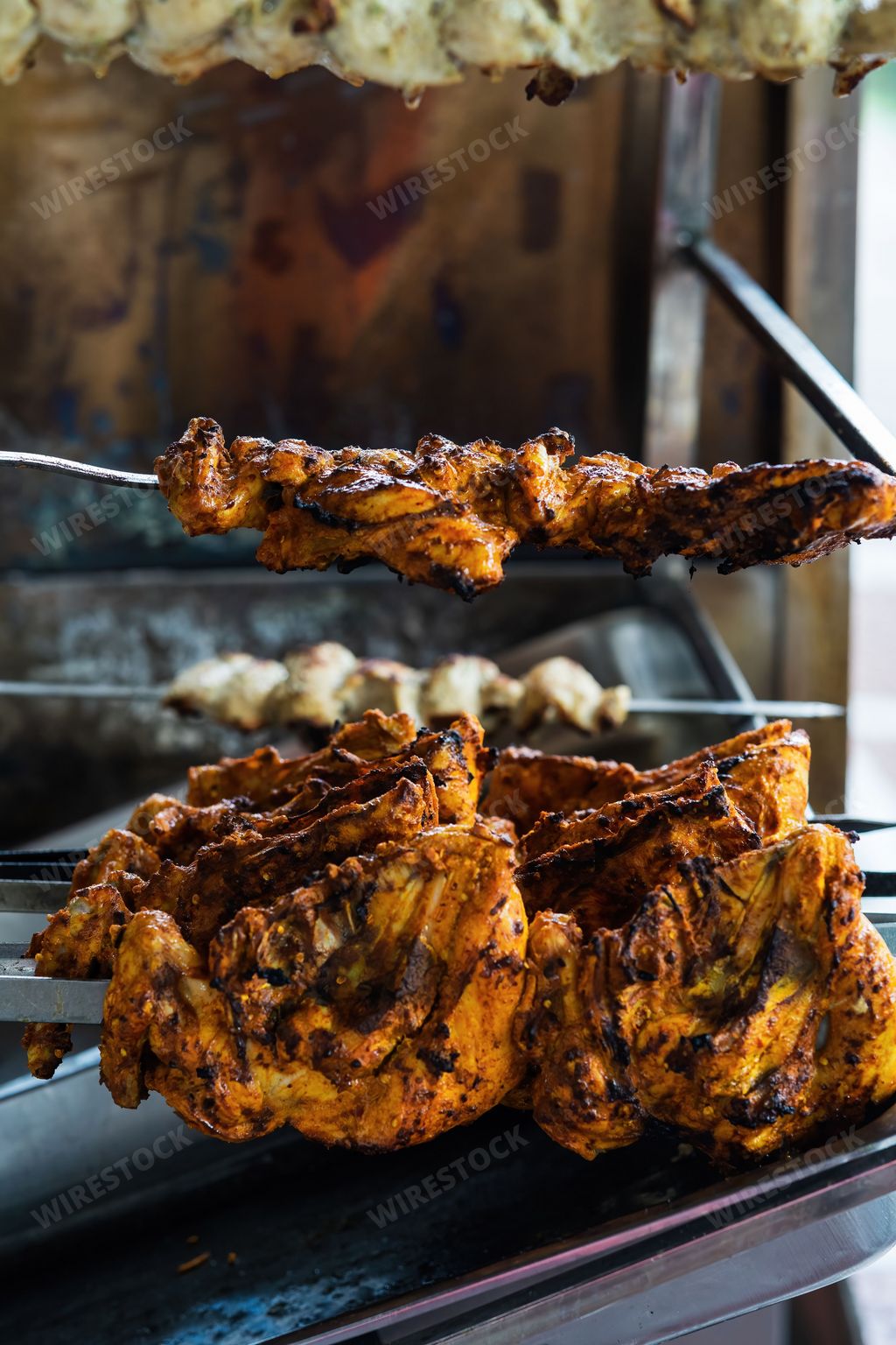Cooking chicken skew Kebab barbeque. Traditional Indian and Paksitan dish cooked on charcoal and flame.
