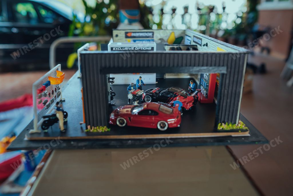 Perak, Malaysia - Aug 12, 2022 : Custom Model Car Toyota Supra in a workshop by Hot Wheels, diorama Made In Malaysia