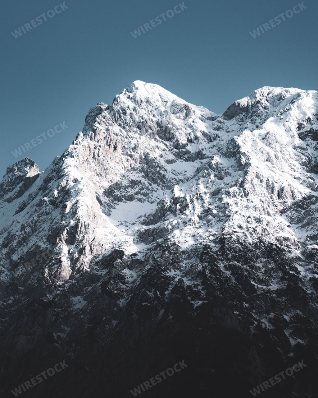 A vertical shot of the Mount Everest during sunrise