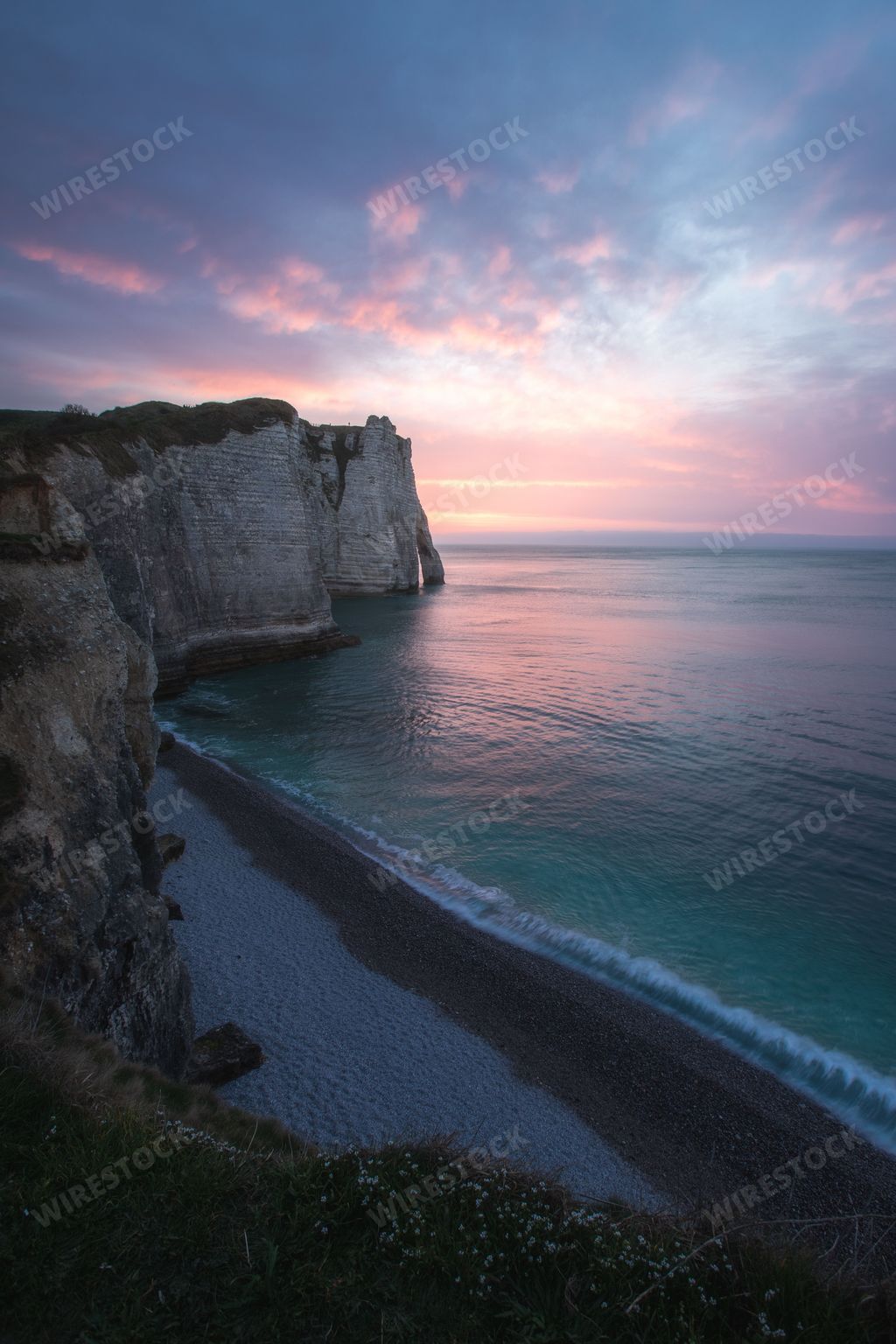 A sunset scene over The famous white cliffs of Etretat and the Alabaster Coast, Normandy, France