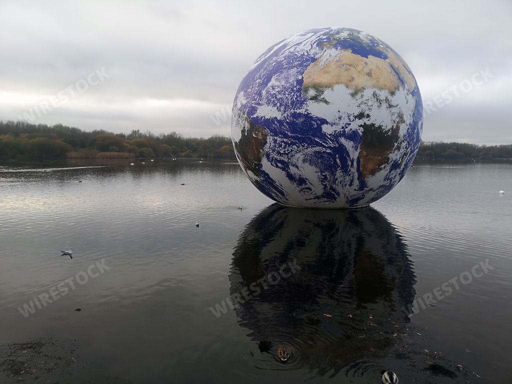 The Luke Jarram Floating earth sculpture in Pennington park. UK