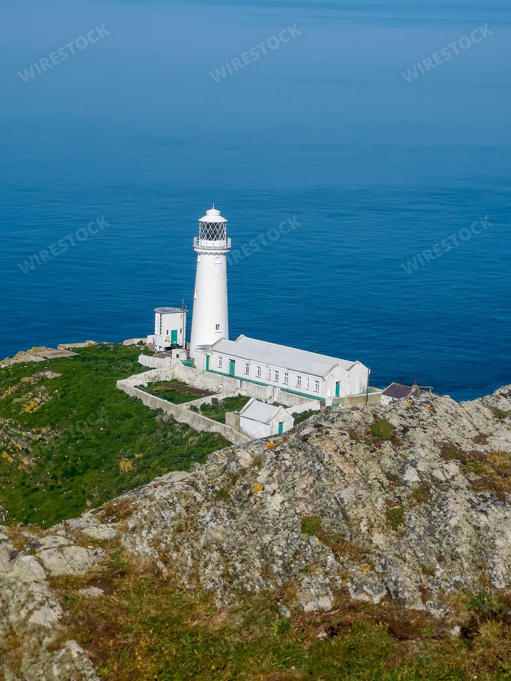 An aerial view of the South Stack Lighthouse in the Island of Anglesey, Wales, United Kingdom