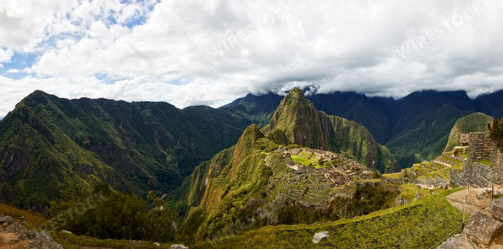A beautiful landscape of Machu Picchu mountain and clouds in Peru