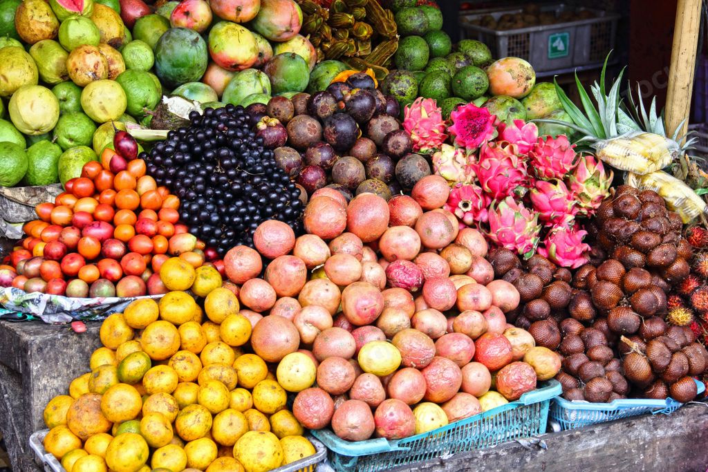 A vibrant selection of tropical fruits from Bali, Indonesia, displayed in a market