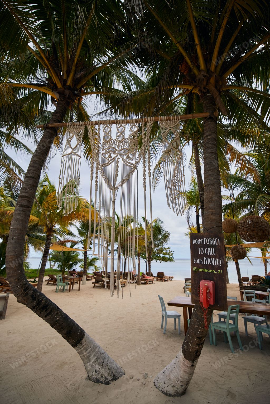 A vertical shot of the Malecon 21 Restaurant in Mahahual, Quintana Roo, Mexico