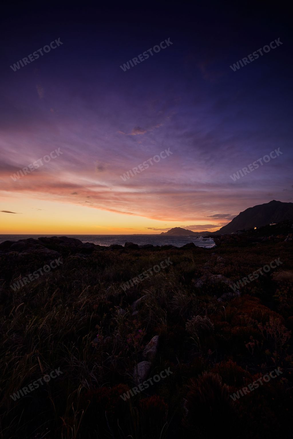 A vertical shot of the sunset over Betty's bay in Western Cape in South Africa
