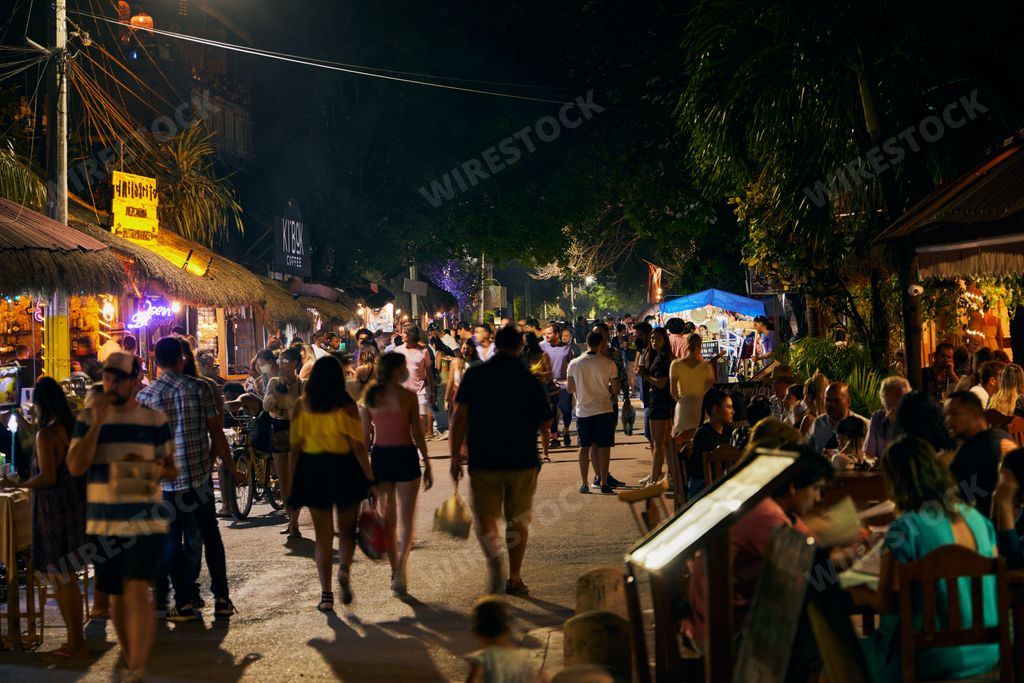 The streets of Tulum at night with a huge crowd of people in Quintana Roo, Mexico