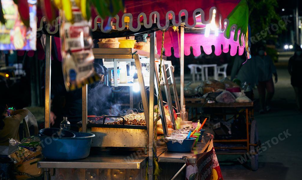 A small street food shop at night in Holbox during pandemic, Quintana Roo, Mexico