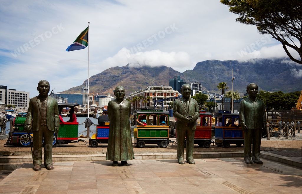 A closeup of steel figures of people at the V&A Waterfront in Cape Town, South Africa