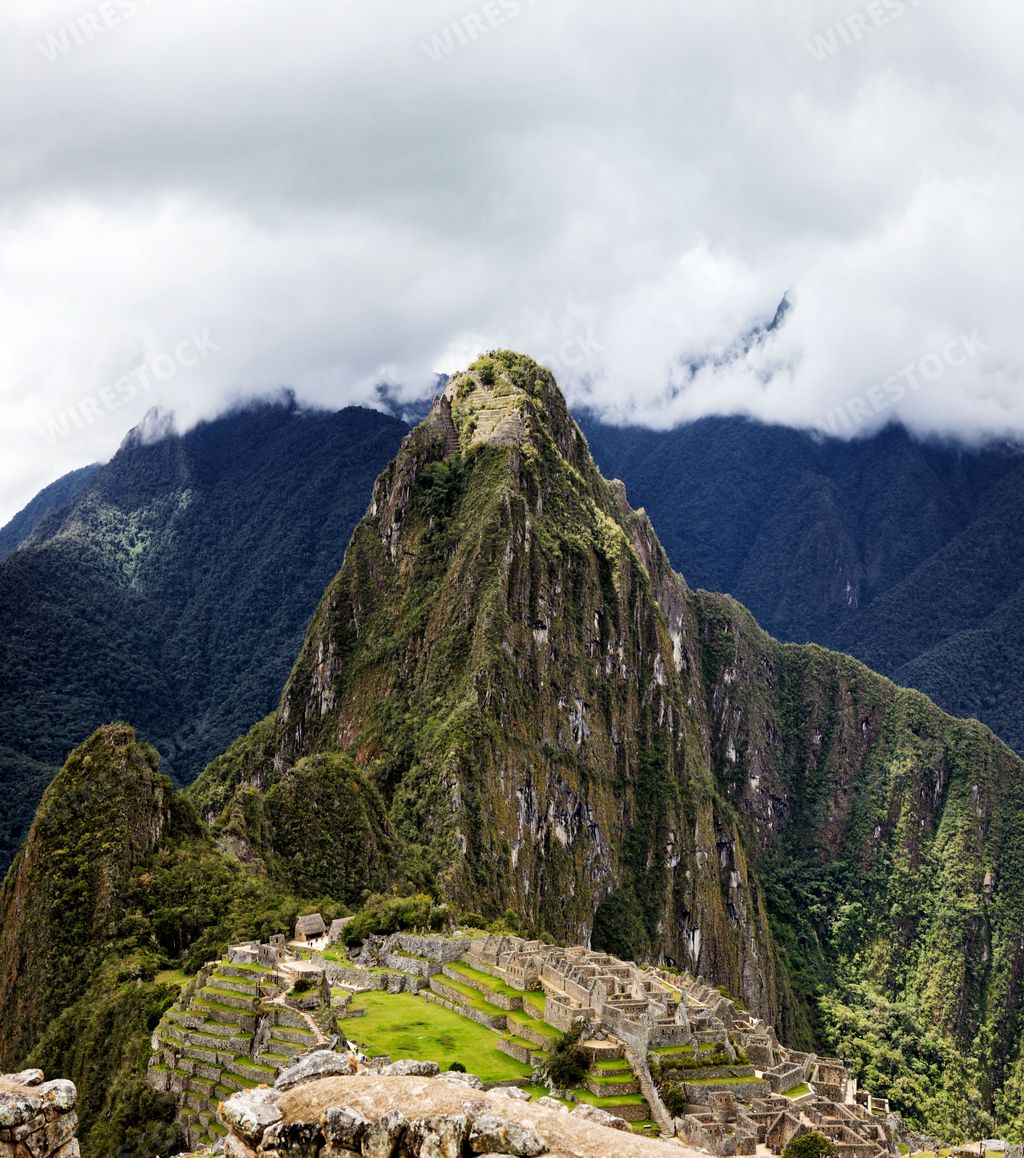 A beautiful landscape of Machu Picchu mountain and clouds in Peru